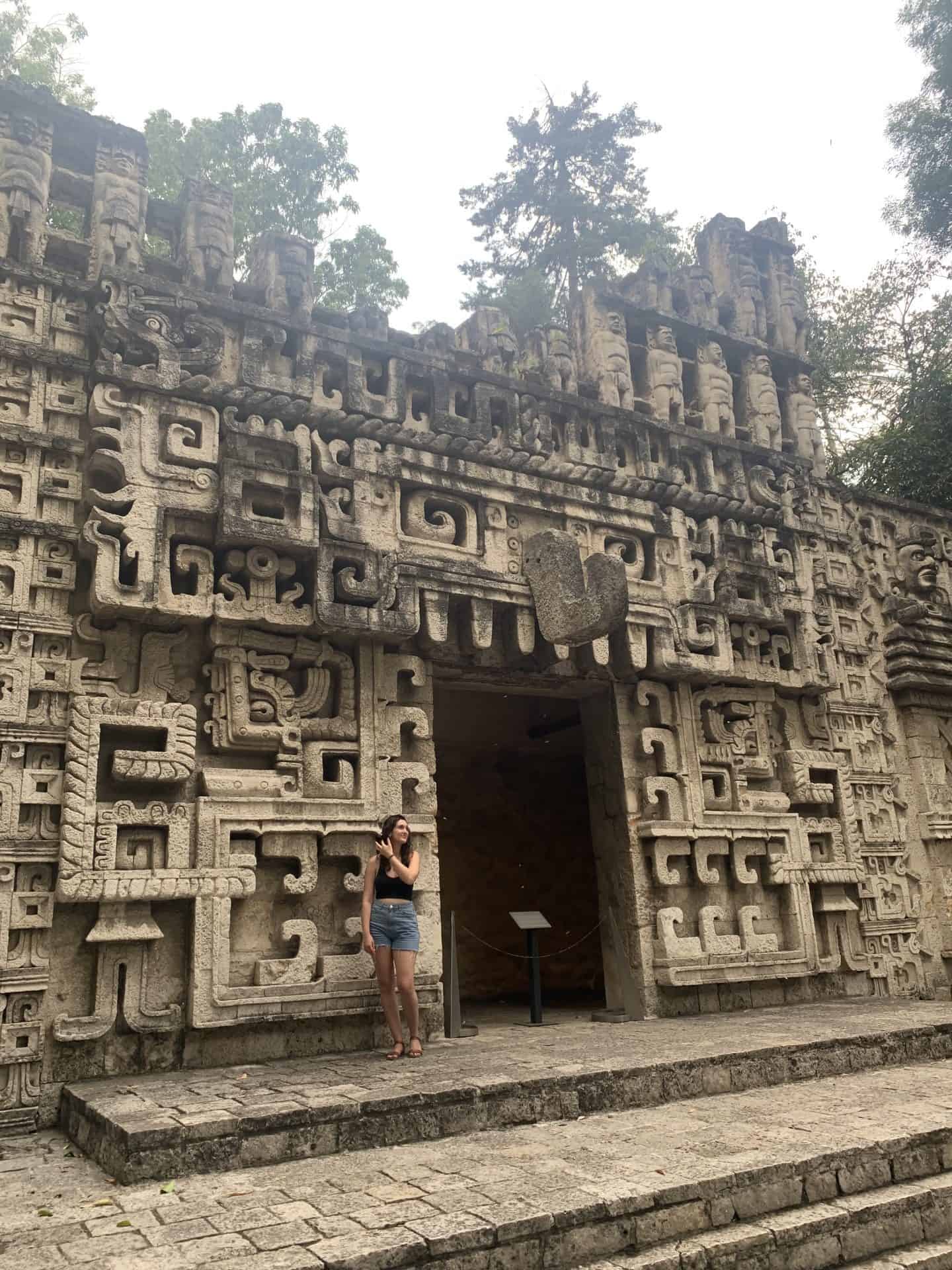 Girl standing at Anthropology Museum, one of the best places to visit in Mexico City