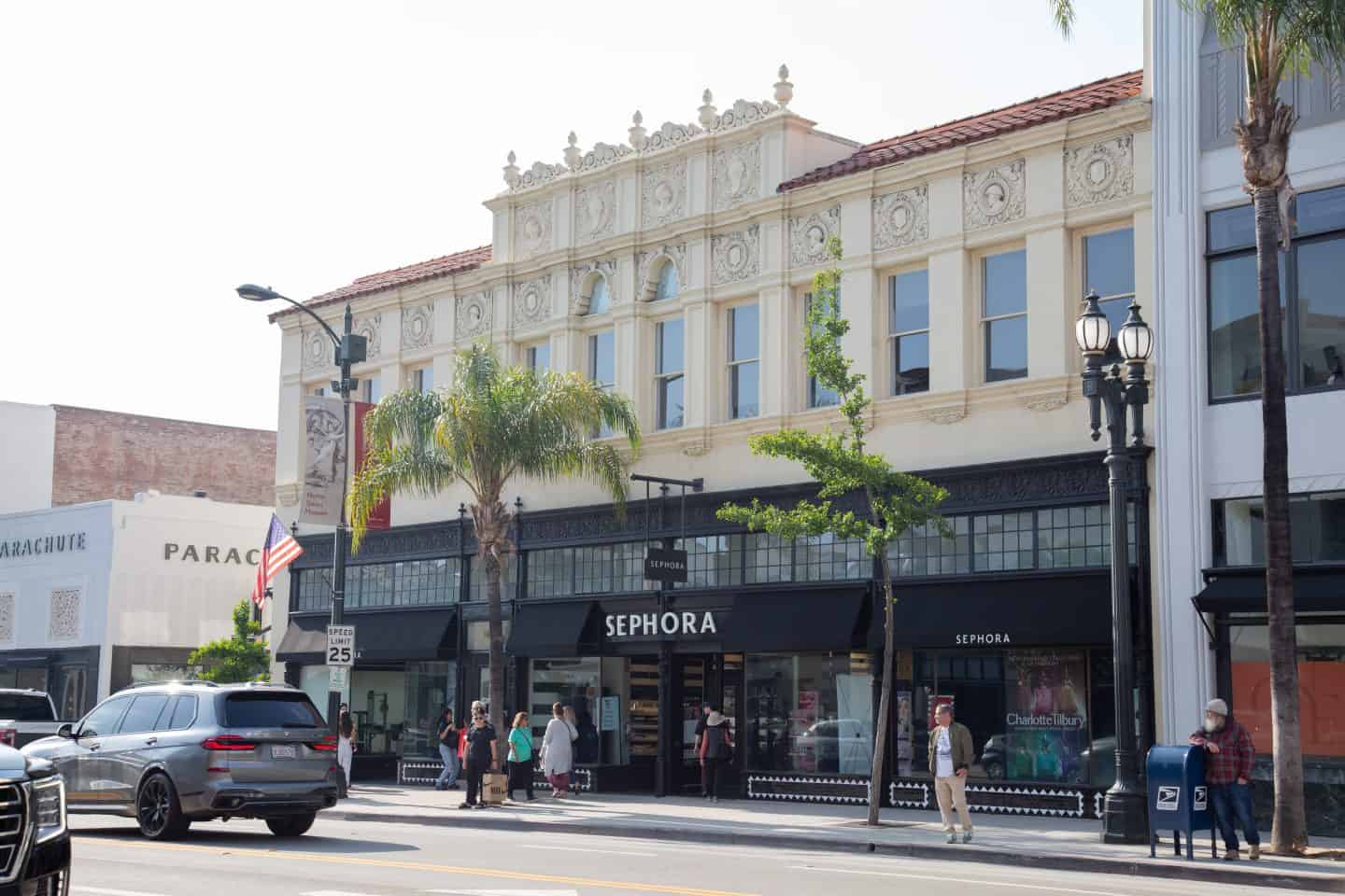 A Sephora in Pasadena, California. The top of the building has many details carved into the building.