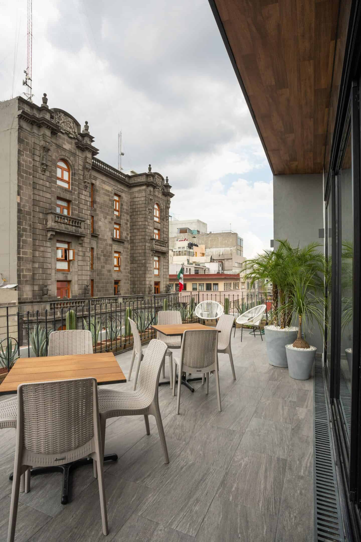View of historic buildings from terrace of Hotel Principal in Mexico City.